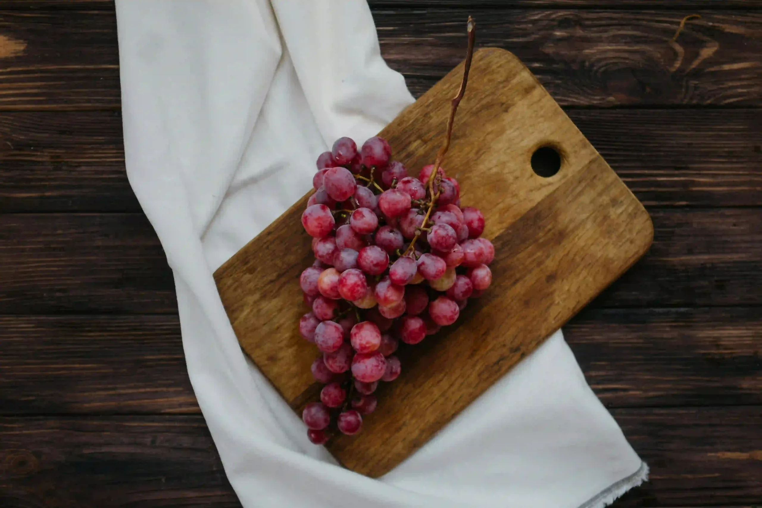 Can Overeating Grapes Lead to Abdominal Pain? Image